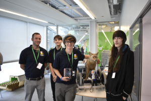 Students and teacher with robotic coyote