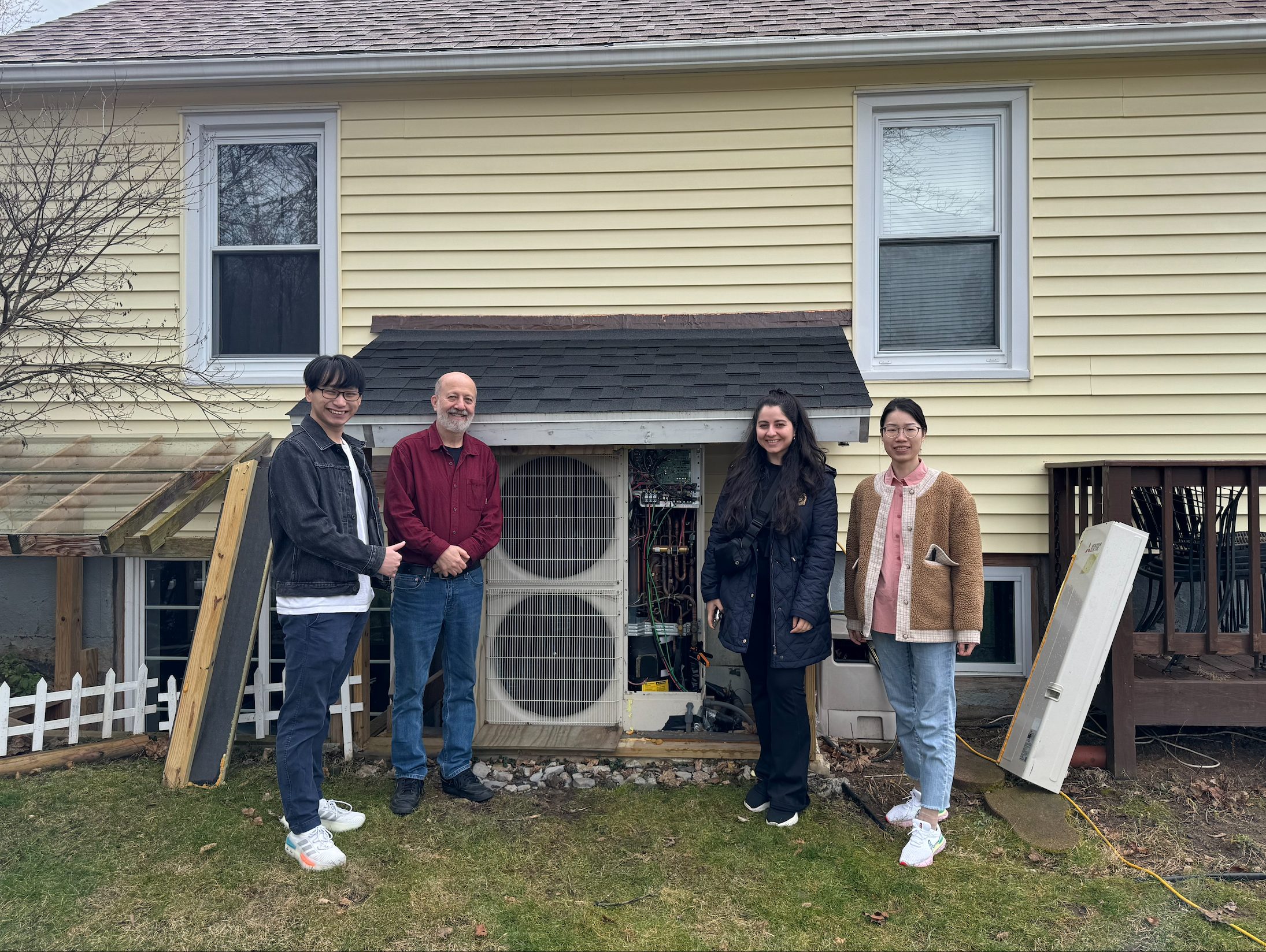 SyracuseCoE faculty and students conducting a heat pump site assessment